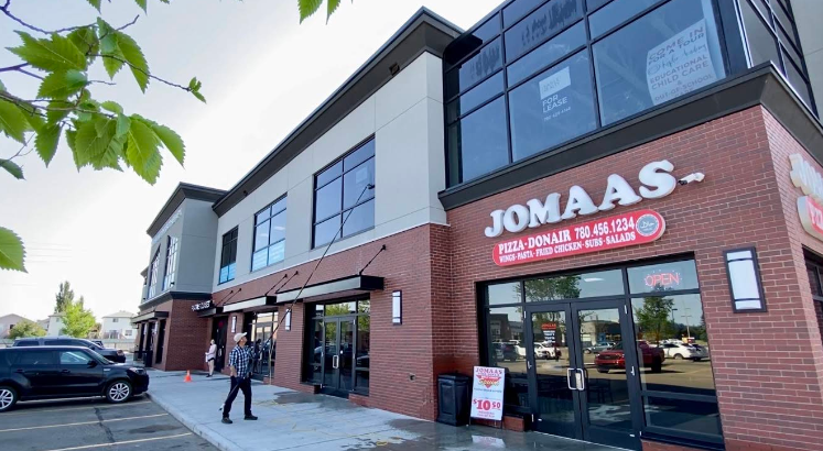 Using an extension pole on upper-level commercial windows